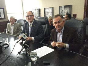 WEEDC officials and Drew Dilkens at City Hall on Dec. 2, 2015.