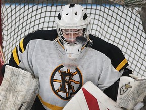 Riverside goalie Nick Dozois takes a puck off the mask during a game Monday, November 30, 2015, at the WFCU Centre in Windsor, ON. against Harrow. (DAN JANISSE/The Windsor Star)