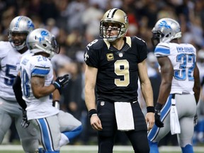 Drew Brees #9 of the New Orleans Saints reacts to a play during the second quarter of a game against the Detroit Lions at the Mercedes-Benz Superdome on December 21, 2015 in New Orleans, Louisiana.  (Photo by Chris Graythen/Getty Images)