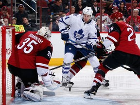 Peter Holland #24 of the Toronto Maple Leafs looks for a rebound after goaltender Louis Domingue #35 of the Arizona Coyotes made a save during the second period of the NHL game at Gila River Arena on December 22, 2015 in Glendale, Arizona.  (Photo by Christian Petersen/Getty Images)