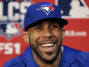 Toronto Blue Jays starting pitcher David Price smiles during a news conference at Kauffman Stadium in Kansas City, Mo., Thursday, Oct. 22, 2015. The Blue Jays face the Kansas City Royals in game six of the ALCS on Friday. (AP Photo/Orlin Wagner)
