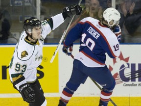London Knights forward Mitch Marner celebrates his first period goal against the Windsor Spitfires during their OHL hockey game at Budweiser Gardens in London, Ont. on Friday December 4, 2015. Craig Glover/The London Free Press/Postmedia Network