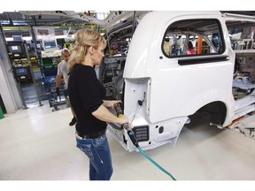 A worker on the production line at Chrysler's Windsor assembly plant.