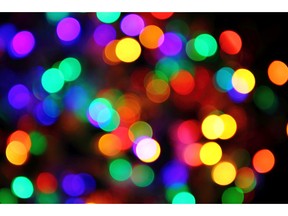 Abstract Christmas background with colour lights. Image by fotolia.com.