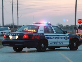 An Amherstburg police car remains at the scene of an accident.