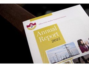 A copy of Ontario Auditor General Bonnie Lysyk's 2015 annual report is seen during a press conference at Queen's Park in Toronto on Wednesday, December 2, 2015.