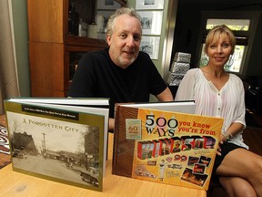 Chris Edwards and Elaine Weeks are photographed with their books A Forgotten City and 500 Ways You Know You're From Windsor in this 2013 file photo.