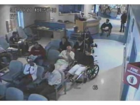 In this file photo, Brian Sinclair (top right in wheelchair) is shown in a screengrab from surveillance footage of his time at the Winnipeg Health Sciences Centre in September, 2008. An inquest was told Tuesday that a man who died in a hospital emergency room was ignored almost the entire 34 hours he was waiting for care, even when he threw up three times.THE CANADIAN PRESS/HO