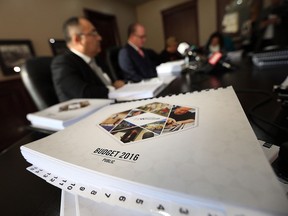 Treasurer Onorio Colucci, Mayor Drew Dilkens and CAO Helga Reidel (left to right) discuss the 2016 City of Windsor budget at city hall in Windsor on Monday, Nov. 30, 2015.
