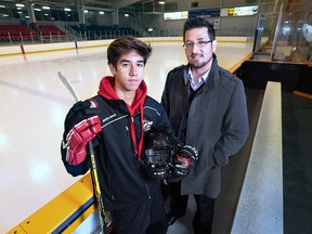 Mark Dubreuil, a chiropractor who operates the Tilbury Rehab Centre and Tecumseh's CARE Concussion Centre is shown with his son Blake, 15, who is a midget minor player in Tecumseh.
