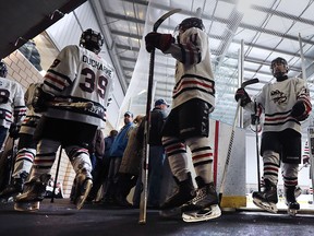 Members of the Tecumseh Eagles exit the ice surface during the 56th annual Riverside Rangers Minor Hockey Association Bantam-Midget Tournament on Tuesday, December 29, 2015 at the WFCU Centre in Windsor, Ont.