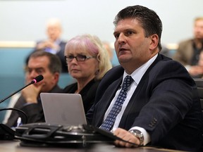 David Cooke, co-chair planning and services steering committee, Janice Kaffer, president and CEO Hotel Dieu Grace Healthcare and David Musyj, president and CEO Windsor Regional Hospital, (left to right) go before Essex County Council to ask for a levy in Essex on Wednesday, Dec. 16, 2015.