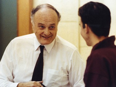 Former Manitoba premier Howard Pawley talks with a student on Oct. 27, 1990.