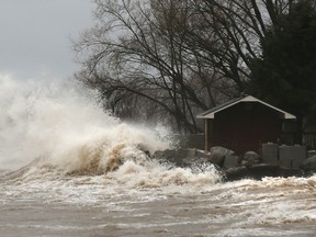 In this file photo from 2015, raging waves crash on the shore near Lakeshore Drive near Fox Run Road in Leamington on Dec. 28, 2015.