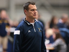 Coach Brett Lumley is shown during the annual Blue and Gold track meet at the University of Windsor on Monday, December 7, 2015. (DAN JANISSE/The Windsor Star)