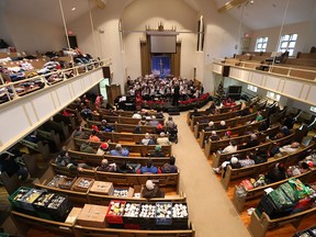 The Gosfield North Public School senior band performs at the Downtown Mission in Windsor, Ontario on December, 17, 2015.  The band performed holiday songs for the Downtown Mission community.  Students from the school donated more than $1000 as well as hats, scarves, gloves, and personal care products.