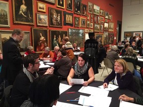 Attendees of Windsor's Ontario Culture Talk crowd the Wilkinson gallery at the AGW on Dec. 3, 2015.