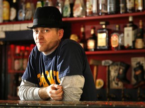 Phog Lounge owner Tom Lucier in his establishment, circa 2005. The downtown bar and live music venue celebrates its 12th anniversary on Jan. 1, 2016.