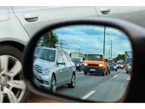 Rearview mirror in rush hour traffic. Photo by fotolia.com.