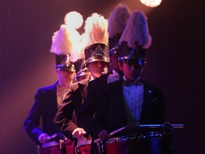 Members of The Diplomats drum corps join The S'Aints for their Christmas charity concert at Caesars Windsor.