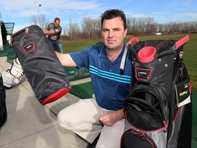 Jeff DeLorenzi of Tecumseh Golf displays Bag Boys Chiller golf bag, with a detachable compartment for six refreshment cans.