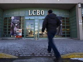 TORONTO, ON: FEBRUARY 13, 2012 -- A man enters the LCBO store located at 2 Cooper Street, near Yonge and Queens Quay, close to the Liquor Control Board of Ontario headquarters at 55 Lakeshore Blvd East in Toronto, Monday afternoon, February 13, 2012.  The LCBO headquarters will be sold and redeveloped to help the Ontario government reduce its $16-billion deficit, according to the province's finance, Dwight Duncan. (Aaron Lynett / National Post) (For Toronto story) //NATIONAL POST STAFF PHOTO ORG XMIT: POS2012123112024769