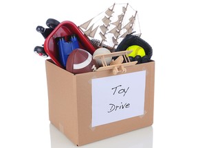 A toy drive donation box is pictured in this photo illustration.