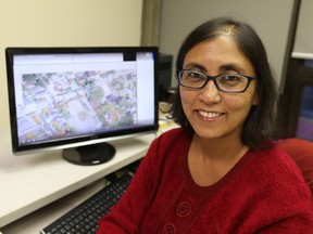 Arunita Jaekel, computer science professor University of Windsor, is a member of a group researchers that are programming sophisticated technology designed to drastically reduce roadway collisions -- research that could revolutionize the way drivers navigate streets and highways, and position the university as a major player in the development of autonomous vehicles. Jaekel is pictured at her office on Tuesday, Dec. 15, 2015.
