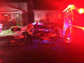 Paramedics transport a victim involved in a shooting at 187 Oak St., in Windsor on Dec. 23, 2015.