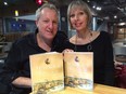 Chris Edwards (left) and Elaine Weeks (right) of Walkerville Publishing with their latest local history book, Walkerville: Whisky Town Extraordinaire.