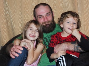 Brian with his daughter, 7, and son, 3.
