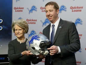 Detroit Lions owner Martha Firestone Ford, left, poses with their new general manager Bob Quinn, right, during a news conference Monday, Jan. 11, 2016, in Allen Park, Mich. (AP Photo/Duane Burleson)