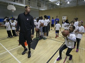 Former NBA player, Morris Peterson, participates in a basketball clinic with kids at the BMO Kidsfest at the YMCA in downtown Windsor, Friday, Jan. 15, 2016.  The NBA is visiting 14 Canadian cities leading up to the All-Star game in Toronto February 14.   (DAX MELMER/The Windsor Star)