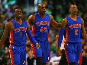 Reggie Jackson #1 of the Detroit Pistons, Anthony Tolliver #43 and Kentavious Caldwell-Pope #5 walk towards the bench during a time out during the fourth quarter against the Boston Celtics  at TD Garden on January 6, 2016 in Boston, Massachusetts. The Pistons defeat the Celtics 99-94. NOTE TO USER: User expressly acknowledges and agrees that, by downloading and/or using this photograph, user is consenting to the terms and conditions of the Getty Images License Agreement.  (Photo by Maddie Meyer/Getty Images)