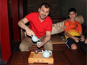 Canadian Salim Alaradi and his son, Mohamed Alaradi are shown on a family vacation in the United Arab Emirates in a 2013 family handout photo. THE CANADIAN PRESS/HO
