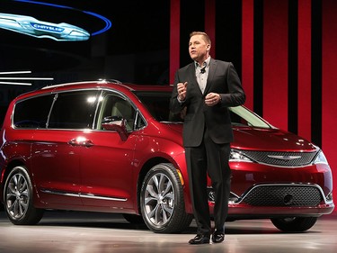 Tim Kuniskis, head of passenger car brands for FCA unveils the 2017 Chrysler Pacifica on Monday, Jan. 11, 2016, at the North American International Auto Show in Detroit, Mich.