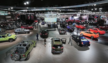 An overall view of the Fiat Chrysler Automobiles display on Monday, Jan. 11, 2016, at the North American International Auto Show in Detroit, Mich.