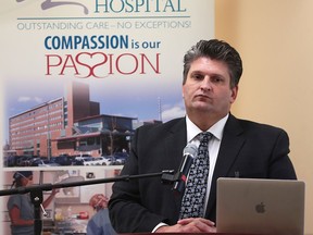 David Musyj, president and CEO at Windsor Regional Hospital, speaks during a media conference on Tuesday, Jan. 12, 2016, at the Met Campus in Windsor, Ont. regarding staff layoffs.