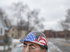Teodoro Montellano is pictured in front of his home in the 600 block of Waterman St., in the Delray neighbourhood of Detroit, MI, Saturday, Jan. 16, 2016. Monetellano's home is now in the process of being expropriated for the new Gordie Howe International Bridge.
