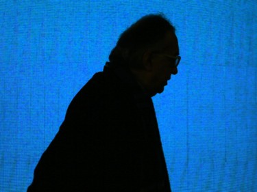 Fiat Chrysler Automobiles CEO Sergio Marchionne is silhouetted against the stage backdrop during the 2016 North American International Auto Show on Monday, Jan. 11, 2016 in Detroit.