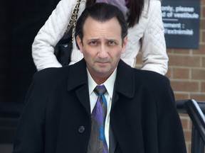 Dr. Charles Nicholas Rathe leaves the Superior Court of Justice in Windsor, Ont. in this January 2015 file photo.