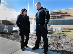 Lisa Gretzky, MPP Windsor West speaks with Randy Simpraga, a correctional officer at the South West Detention Centre on Thursday, January 7, 2016. Simpraga is also president of OPSEU local 135. Gretzky toured the facility and is very concerned about the impact of a strike or lockout of the correctional officers. (DAN JANISSE/The Windsor Star)