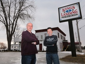 George Mantziouras (L) and Greg Triferis, owners of the Kings Landing restaurant in Kingsville, Ont., are shown in front of the business on Thursday, Jan. 28, 2016.
