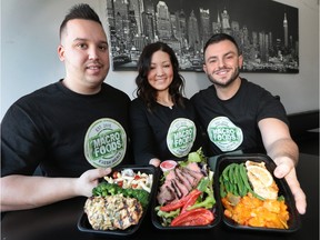 Chris Boyle, left, Sara Ducharme and Matt Athan of Macro Foods display some of the healthy dishes the company makes.