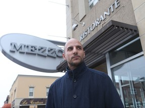 Filip Rocca, owner of Mezzo Restaurant and Lounge is shown outside his Erie Street establishment on Jan. 28, 2016.   Rocca may not open his patio along Erie Street due to the high fees by the city.