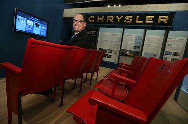 Mayor Drew Dilkens sits in seats that were used in the Olympia and Windsor Arenas at the Chimczuk Museum in Windsor on Thursday, Jan. 14, 2016.