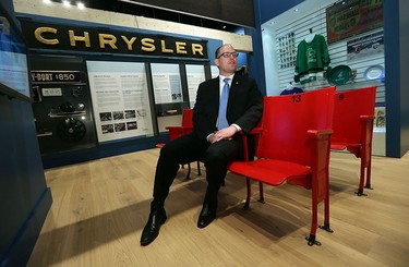 Mayor Drew Dilkens sits in seats that were used in the Olympia and Windsor Arenas at the Chimczuk Museum in Windsor on Thursday, Jan. 14, 2016.