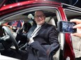 Windsor Mayor Drew Dilkens sits in the new 2017 Chrysler Pacifica at the 2016 North American Auto Show on Jan. 11, 2016 in Detroit, Mich.