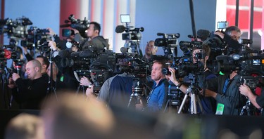Members of the media wait for the launch of the 2017 Chrysler Pacifica at the 2016 North American International Auto Show on Jan. 11, 2016 in Detroit, Mich.