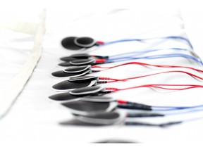 Professional electrostimulation device, medical therapy in modern medicine. Photo by fotolia.com.